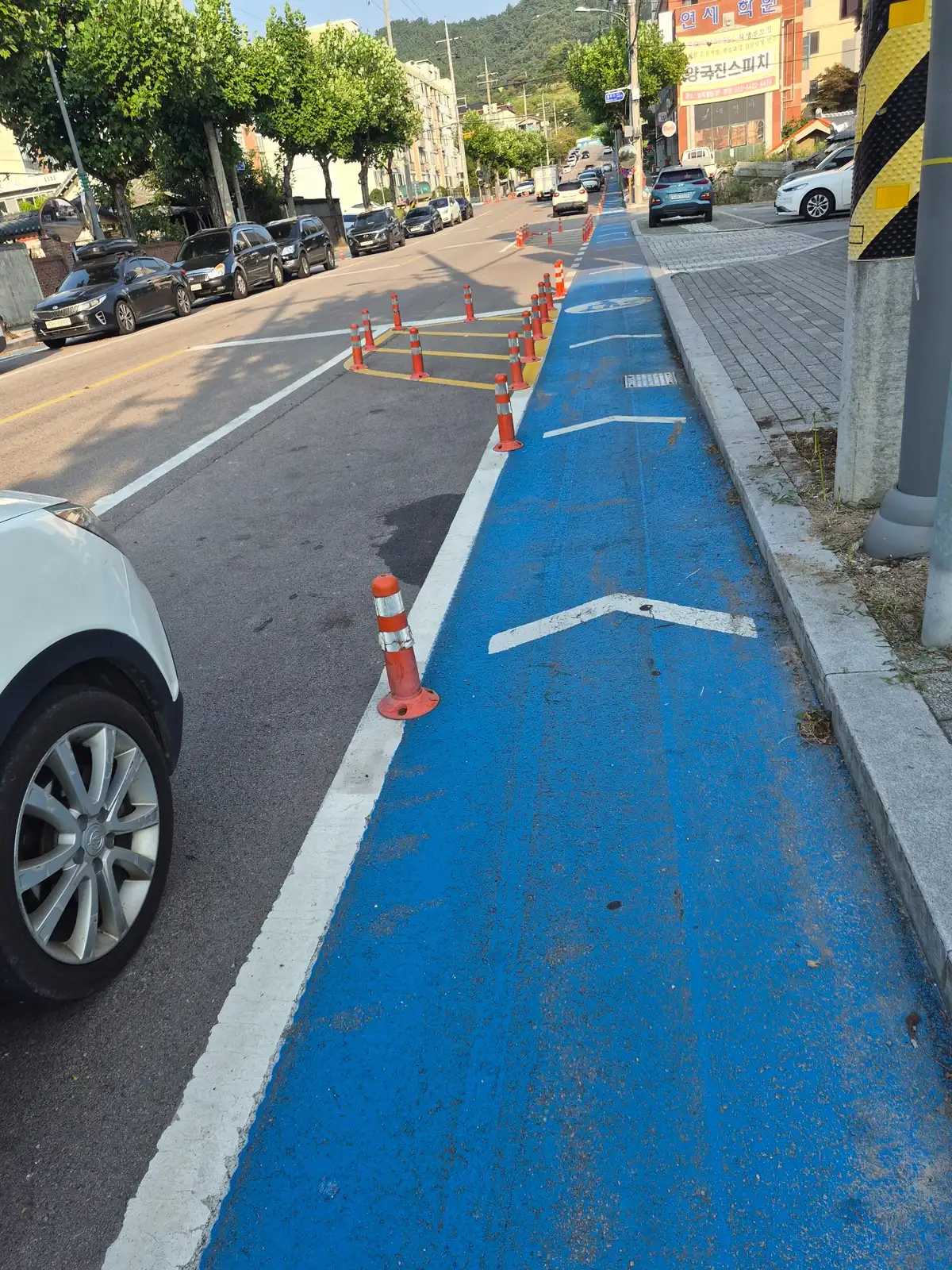 Blue e-mobility lane running through downtown Yeonggwang in South Korea
