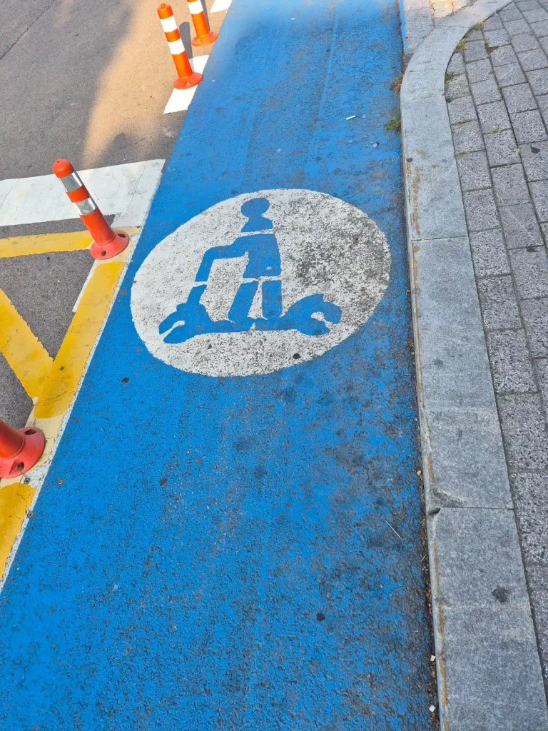 e-Mobility road marking painted on a blue lane in Yeonggwang, South Korea