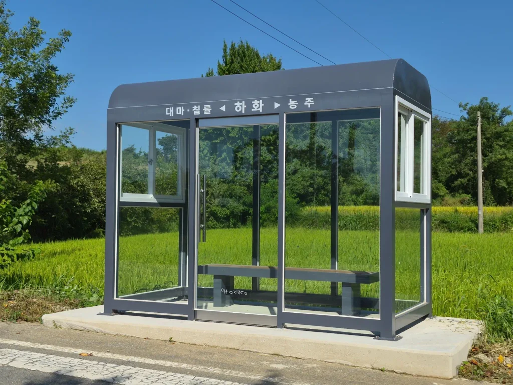 Modern rural bus stop beside fields in South Korea