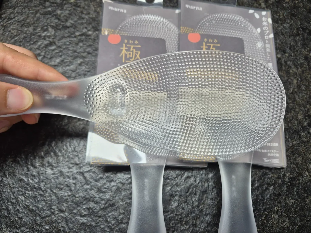 Close-up of the textured surface of a Japanese nonstick rice paddle
